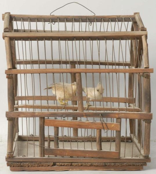 PRIMITIVE WOODEN AND WIRE BIRD CAGE.              