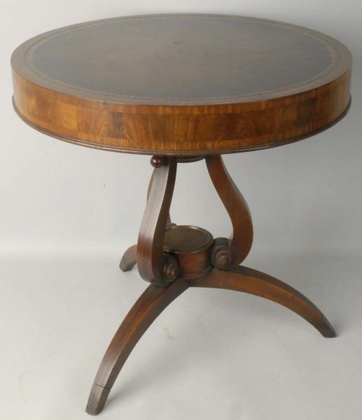 LEATHER TOP OVAL TABLE.                           