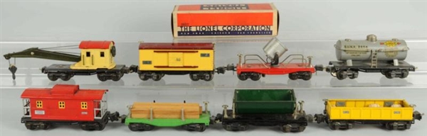 LOT OF 8: LIONEL 2600 SERIES FREIGHT TRAIN CARS.  