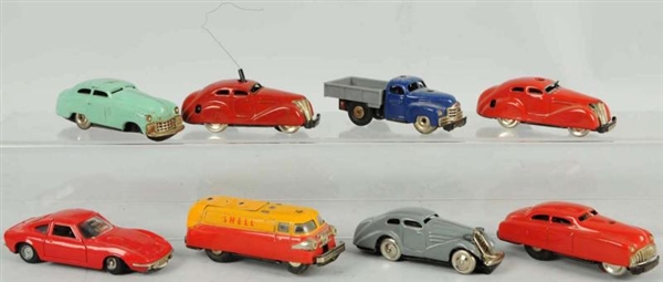LOT OF 8: SCHUCO WIND-UP VEHICLE TOYS.            