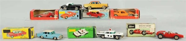 LOT OF 7: SCHUCO WIND-UP MICRO RACER VEHICLES.    