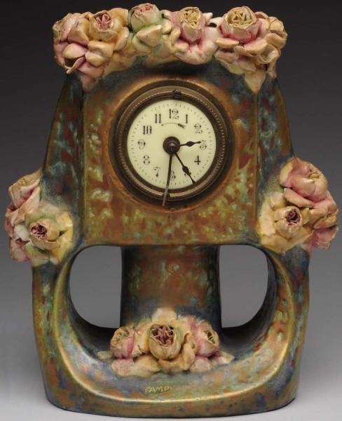 AMPHORA CERAMIC CLOCK WITH APPLIED ROSES.         