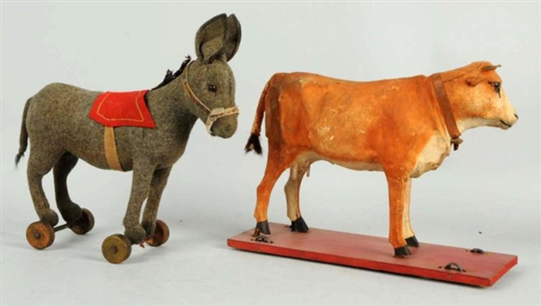 LOT OF 2: EARLY ANIMAL ON PLATFORM TOYS.          