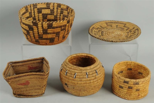 LOT OF 5: WOVEN BASKETS.                          