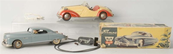 LOT OF 2: TIN TOY CARS.                           