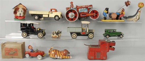 LOT OF TIN TOYS & TOY PARTS.                      