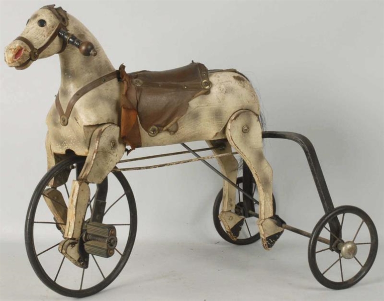 WOODEN TRICYCLE HORSE.                            