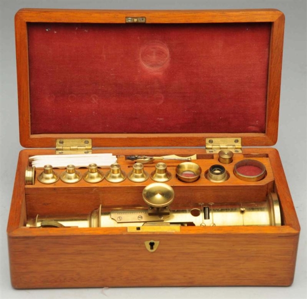 LONDON BRASS COMPOUND MICROSCOPE IN WOODEN BOX.   
