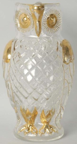 GOLD-TRIMMED GLASS OWL PITCHER.                   