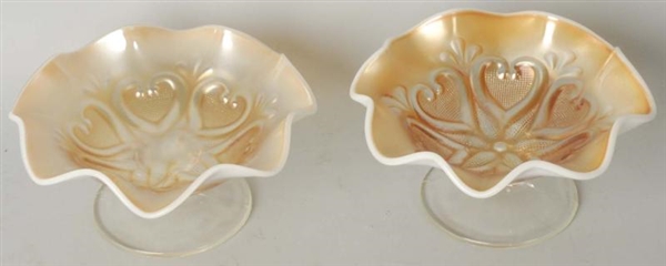 PAIR OF CARNIVAL GLASS COMPOTES.                  