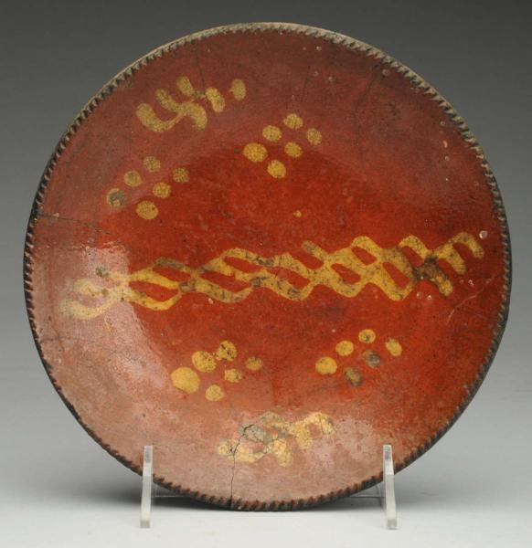 REDWARE EARLY PLATE WITH CRACKS.                  