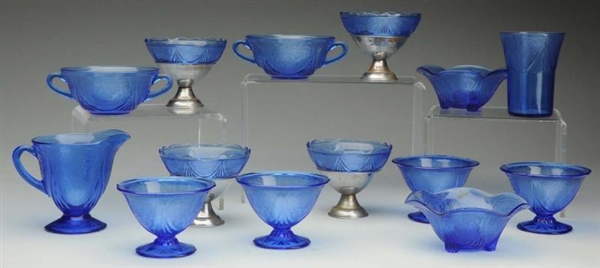 LOT OF 14: PIECES OF BLUE DEPRESSION GLASS.       