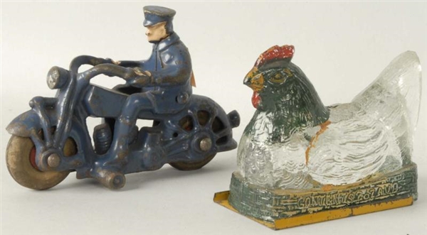 CAST IRON MOTORCYCLE & HEN CANDY CONTAINER.       
