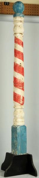 RED & WHITE BARBER POLE WITH BALL TOP.            