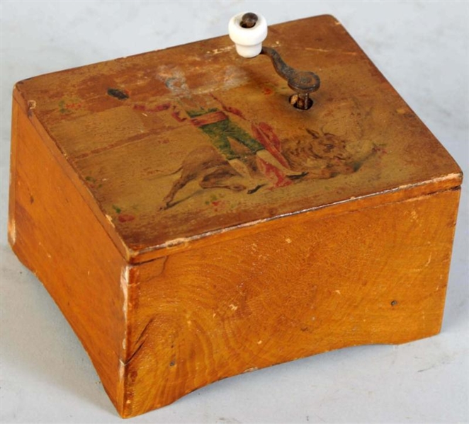 SMALL HAND-CRANK MUSIC BOX.                       