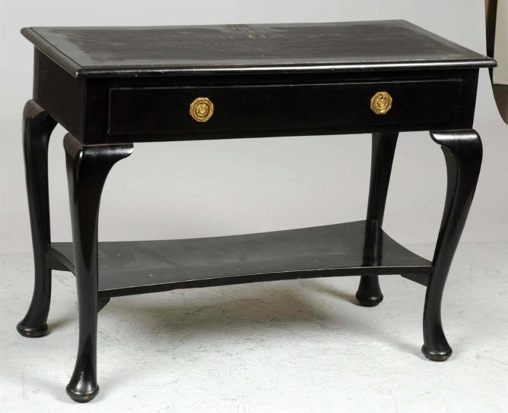BLACK WOODEN TABLE WITH GOLD HANDLES.             
