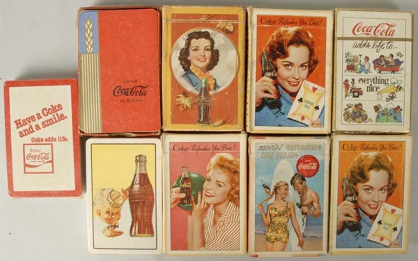 LOT OF 9: DECKS OF COCA-COLA PLAYING CARDS.       