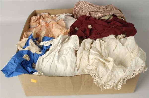 BOX LOT OF ANTIQUE DOLL CLOTHES.                  