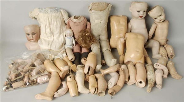 BOX LOT OF ANTIQUE DOLL PARTS.                    