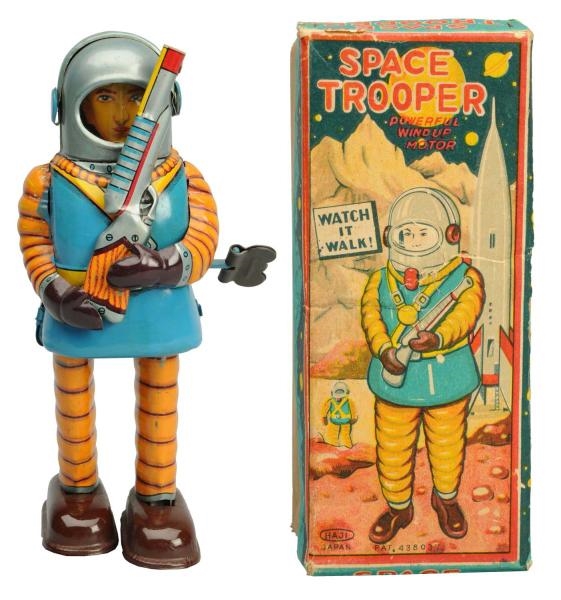 TIN LITHO & PAINTED WIND-UP SPACE TROOPER.        