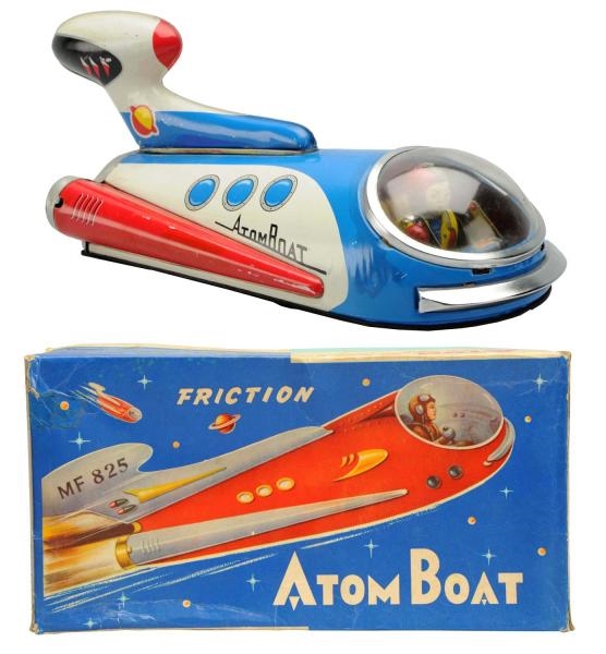 TIN FRICTION ATOM BOAT.                           