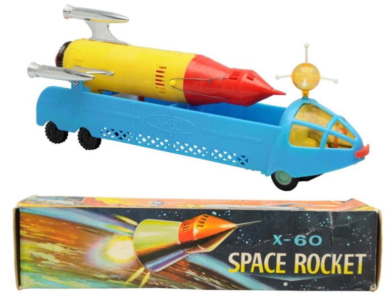 PLASTIC FRICTION SPACE ROCKET ON LAUNCHING TRUCK. 