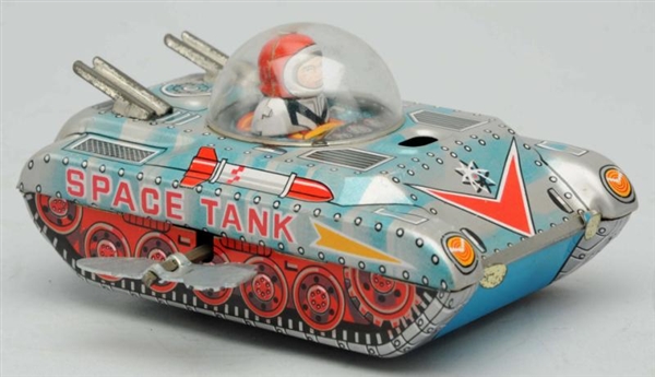 TIN LITHO WIND-UP SPACE TANK.                     