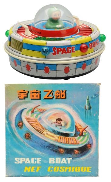 TIN LITHO BATTERY-OPERATED SPACE BOAT.            
