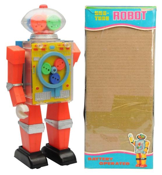 PLASTIC BATTERY-OPERATED SEE-THRU ROBOT.          