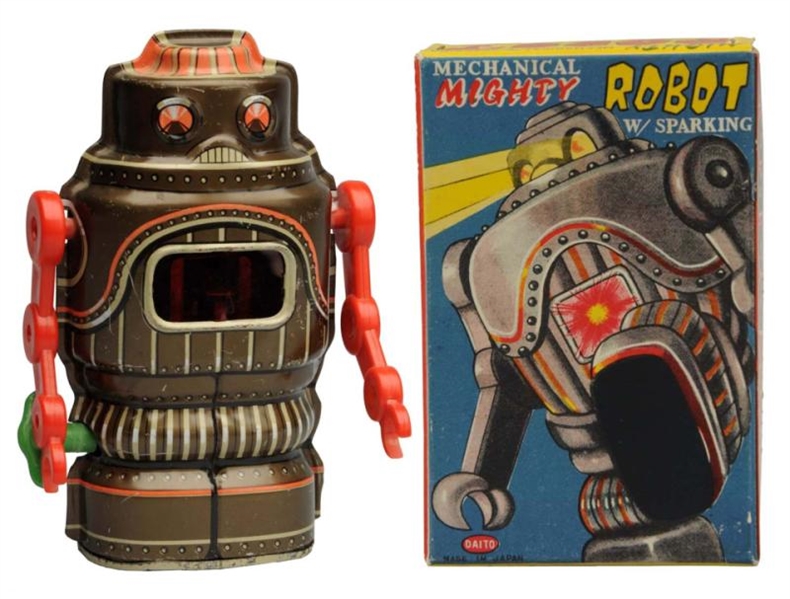 TIN LITHO WIND-UP MIGHTY ROBOT.                   