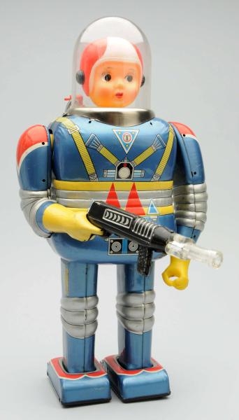 TIN LITHO BATTERY-OPERATED ASTRONAUT ROBOT.       