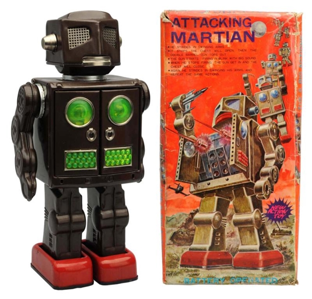 TIN PAINTED BATTERY-OPERATED ATTACKING MARTIAN.   