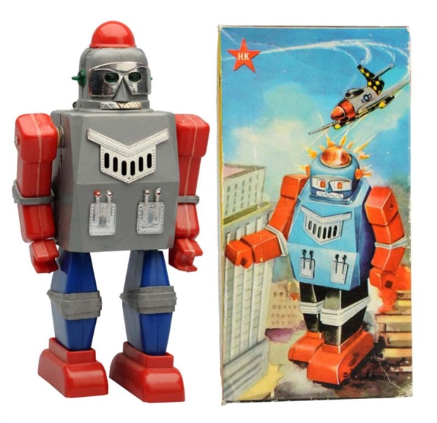 PLASTIC BATTERY-OPERATED WALKING ROBOT.           