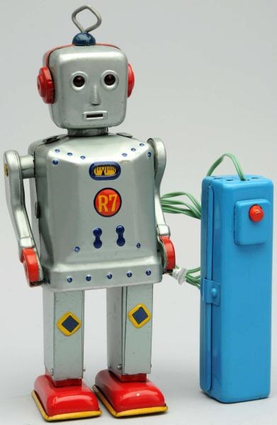 TIN LITHO PAINTED BATTERY-OPERATED R7 ROBOT.      