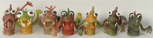LOT OF 7: OILY JIGGLERS FINGER PUPPETS.           