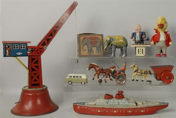 LOT OF 7: ASSORTED TIN LITHO & CELLULOID TOYS.    