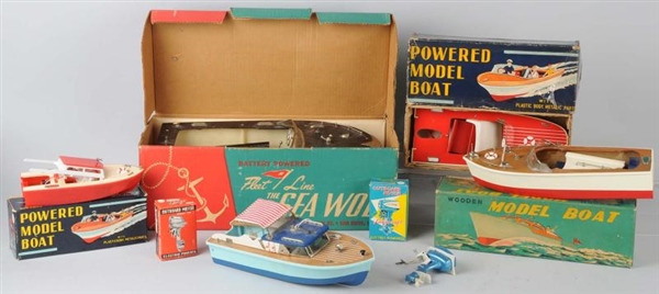 LARGE LOT OF BATTERY-OPERATED BOATS & MOTORS.     