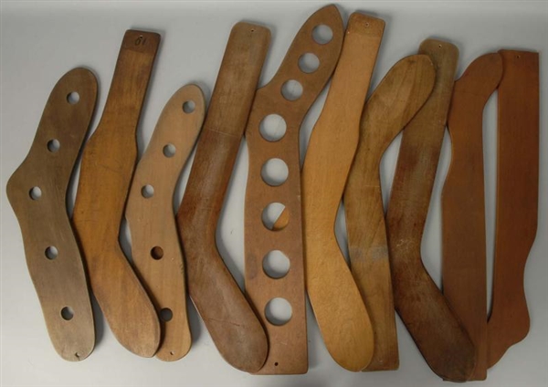 LOT OF 11: WOODEN SOCK STRETCHERS.                