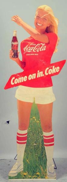 1960S COCA-COLA LIFE-SIZE STANDEE CUTOUT.         
