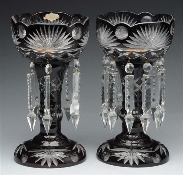 PAIR OF RUBY CUT GLASS TABLE CANDLE HOLDER.       