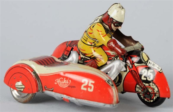 TIN LITHO HUKI MOTORCYCLE WITH SIDECAR TOY.       