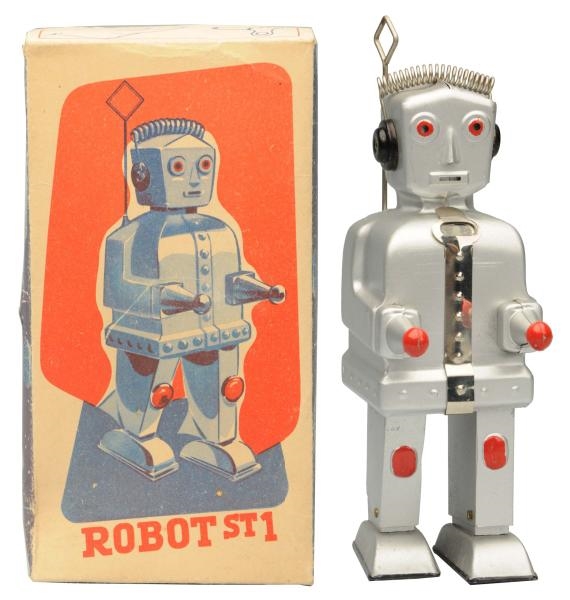 TIN PAINTED WIND-UP ROBOT ST-1.                   