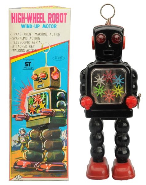 TIN PAINTED WIND-UP HIGH WHEEL ROBOT.             