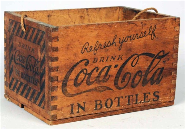 1920S COCA-COLA WOODEN DOVETAILED CARRIER.        