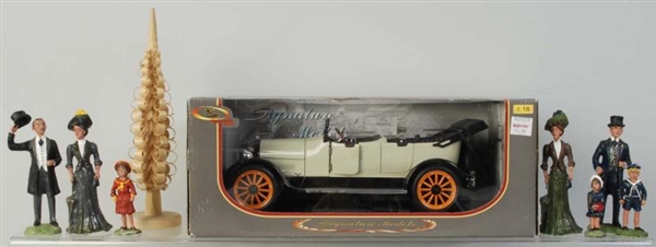 RESIN CAST VICTORIAN FAMILY & 1917 REO CAR.       