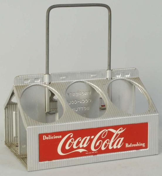 1950S COCA-COLA ALUMINUM 6-PACK CARRIER.          