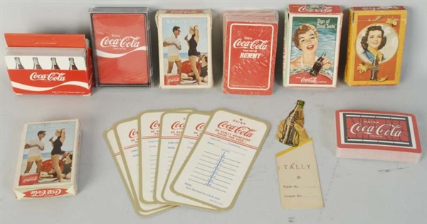 LOT OF 7: ASSORTED COCA-COLA CARD DECKS.          