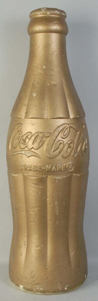 1950S GOLD COCA-COLA STYROFOAM DISPLAY BOTTLE.    