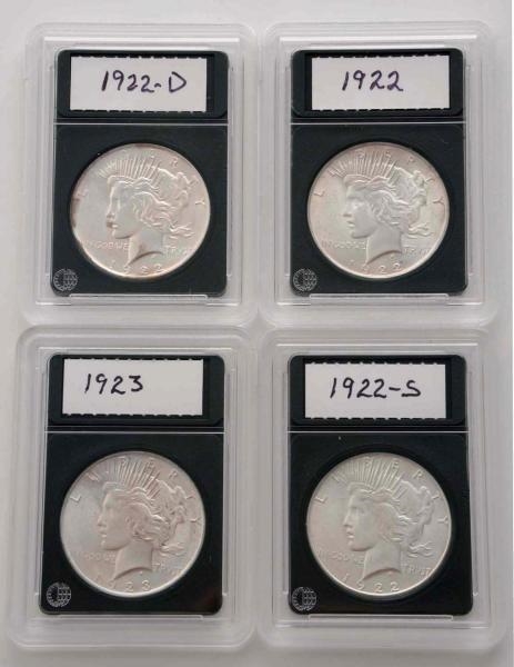LOT OF 4: PEACE SILVER DOLLARS.                   