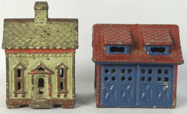 LOT OF 2: CAST IRON HOUSE STILL BANKS.            